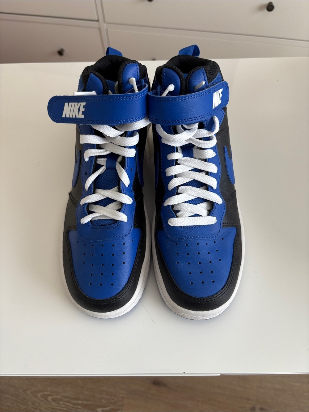 Nike Black and Blue High-Top Sneakers with White Accents